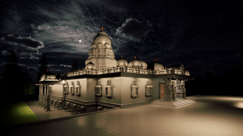 Adi Chunchungiri temple at night under moonlit sky with warm façade lighting