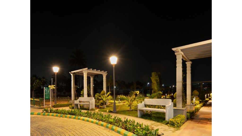 36 Avenue Park walkways, pergolas and vintage streetlamps at night