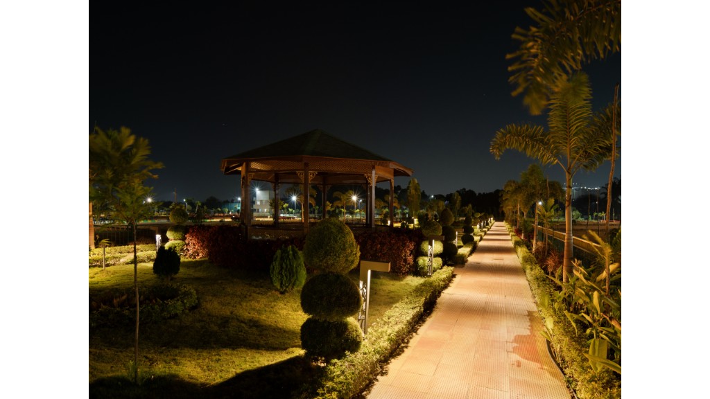 36 Avenue Park wooden gazebo and illuminated landscape